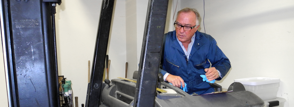 inspecting forklift in slideshow